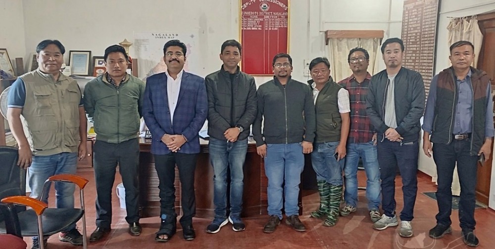 Central nodal officers Kushagra Mittal and Saket Kumar with DC Mali and others during their visit to Zunheboto on June 2. (DIPR Photo)